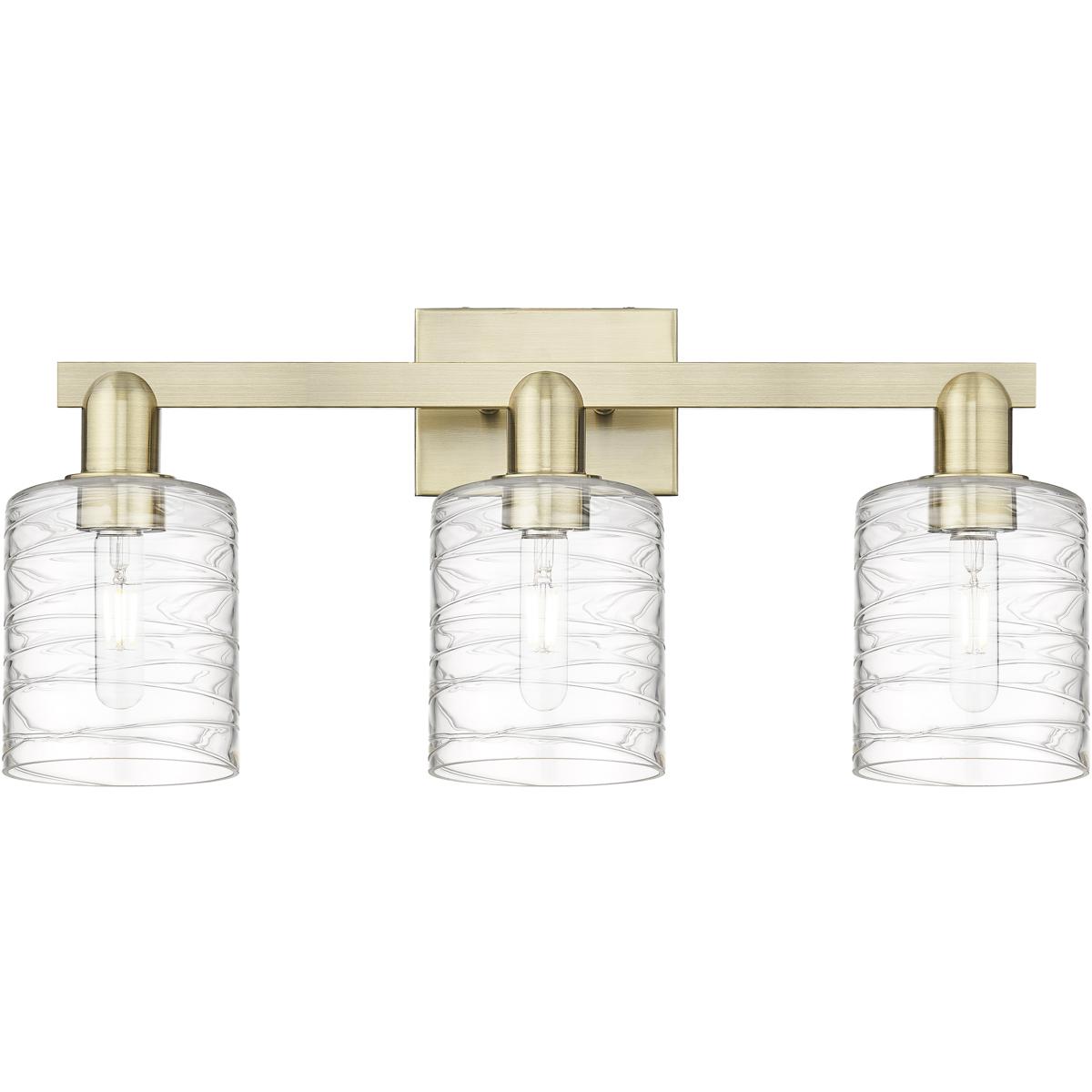 Innovations Lighting 716-3W-AB-G1113 Arcadia Cobbleskill 3 Light 24 inch Antique Brass Bath Vanity Light Wall Light in Deco Swirl
